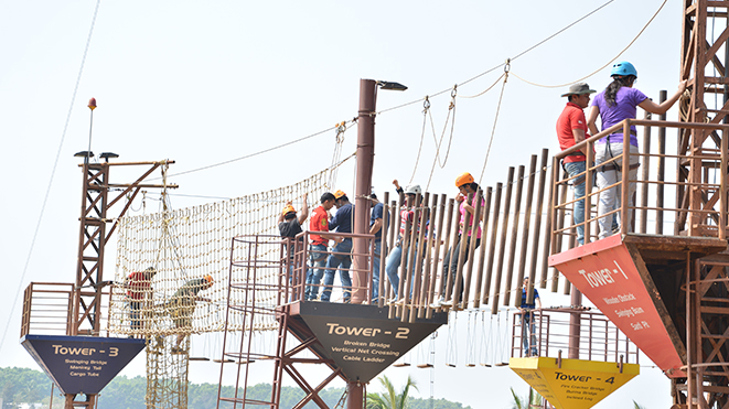 Enjoy Vertical Net Crossing at High Rope Challenge Activity at Della
